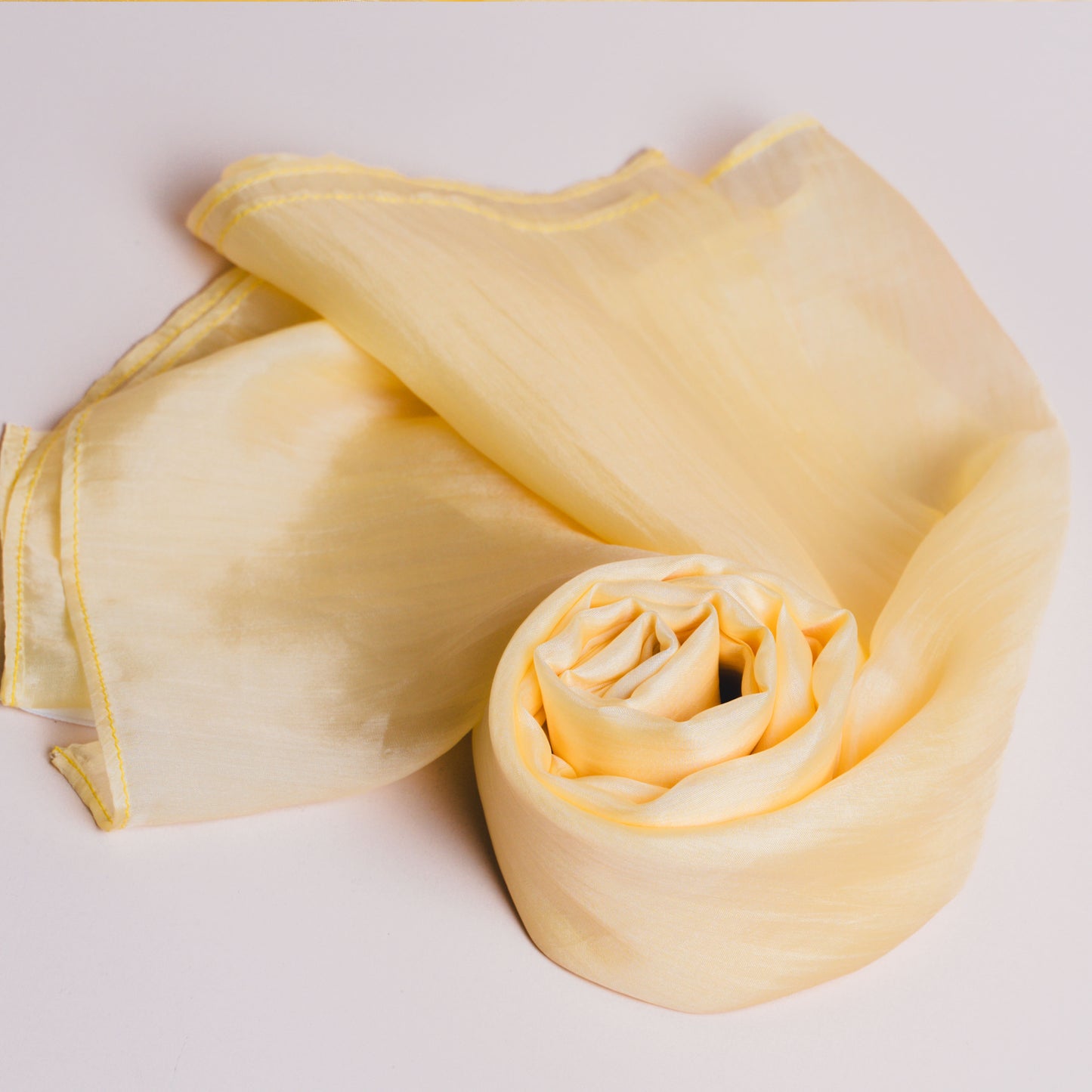 Golden yellow silk scarf styled for a special occasion by Silk & Bears