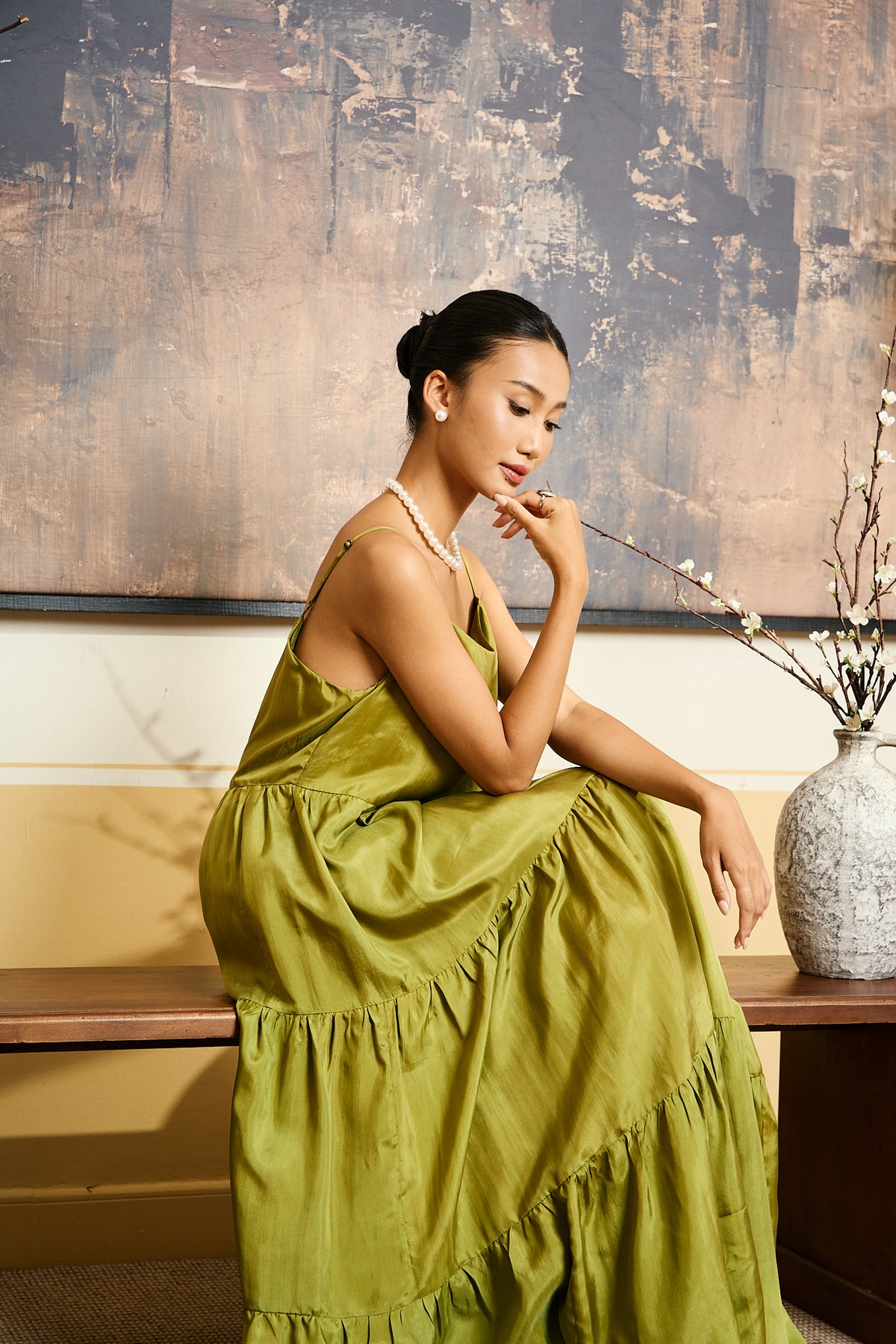 Model in embroidered black velvet dress with emerald green silk shawl — Silk & Bears