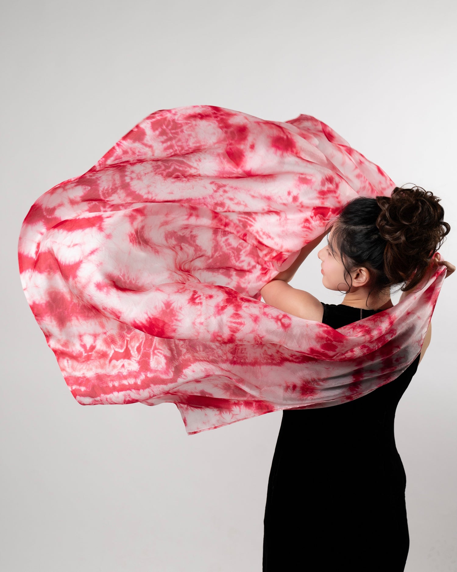 Hand-dyed crimson shibori mulberry silk scarf, artisan-made in Vietnam