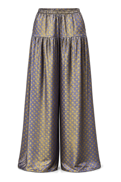 Portia Dusk Gold blue-violet silk jacquard wide-leg trousers with small gold flower motif, front view on white