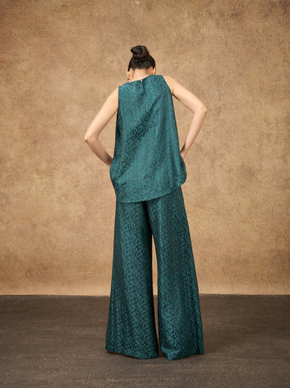 Ophelia teal dynasty wide-leg silk palazzo trousers, shown from the side