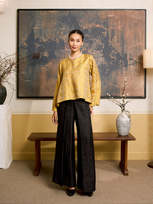 Model wearing the Ophelia golden eclipse draped silk tunic blouse