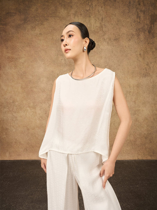 Model wearing the Ophelia ivory mist draped silk shell top