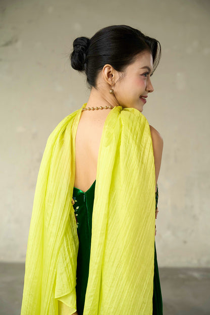 Close view of the citrine silk scarf showing the fine lengthways crinkle and hand-dyed sheen
