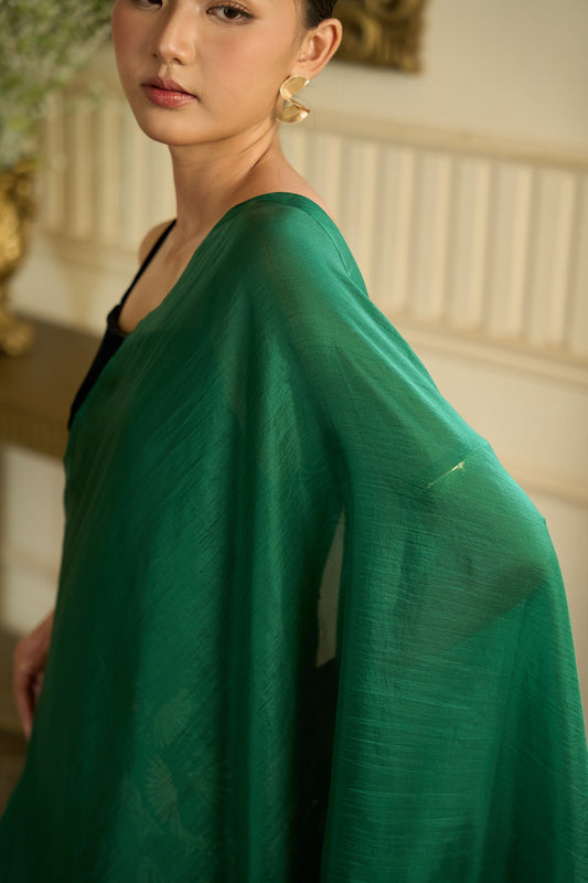 Detail of the forest green mulberry silk scarf draping softly