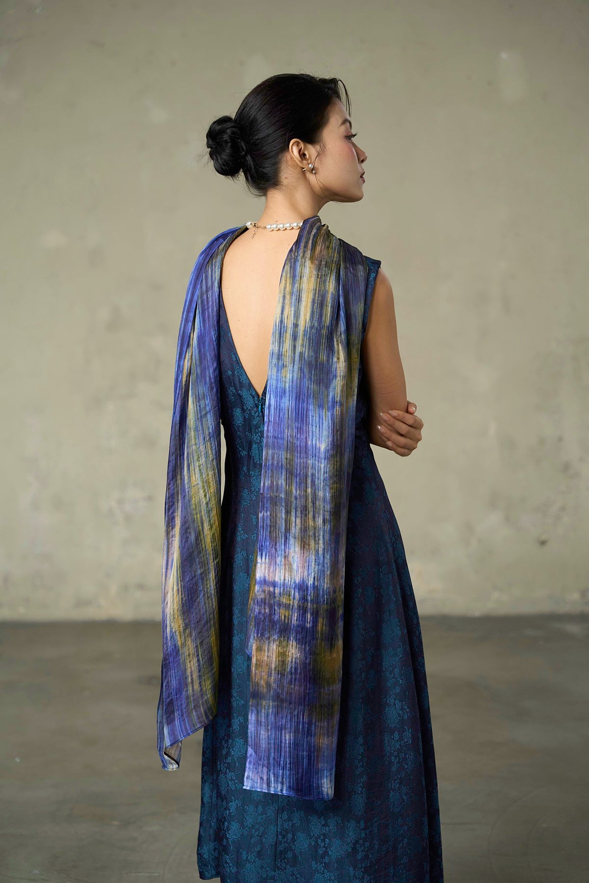 Back view of the Iris Field silk scarf in full drape across the shoulders