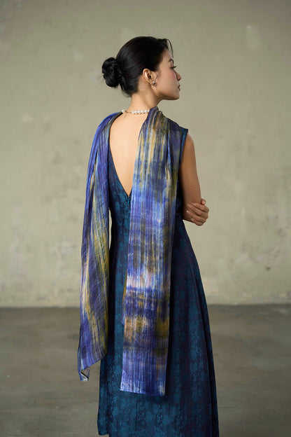Back view of the Iris Field silk scarf in full drape across the shoulders