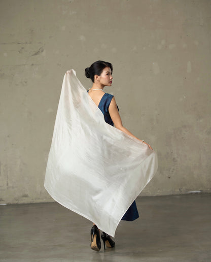 Oyster silk scarf held open to show the full 85 x 180 cm length and its soft pearl sheen