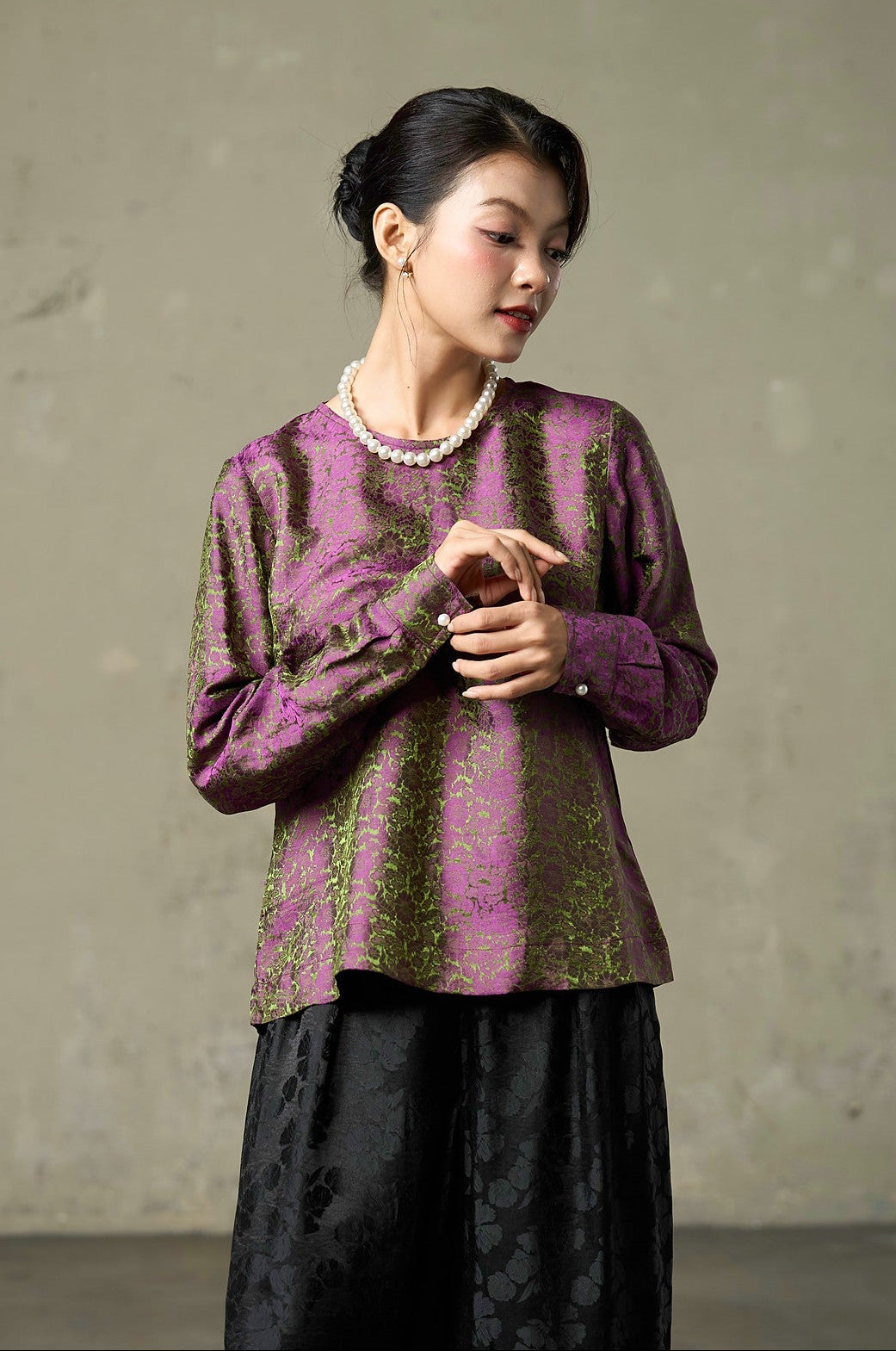 Magenta silk jacquard blouse with olive-green woven floral, round neck and long sleeves, front view