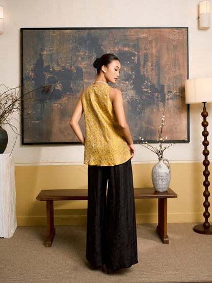 Detail of the Ophelia black wide-leg silk palazzo trousers