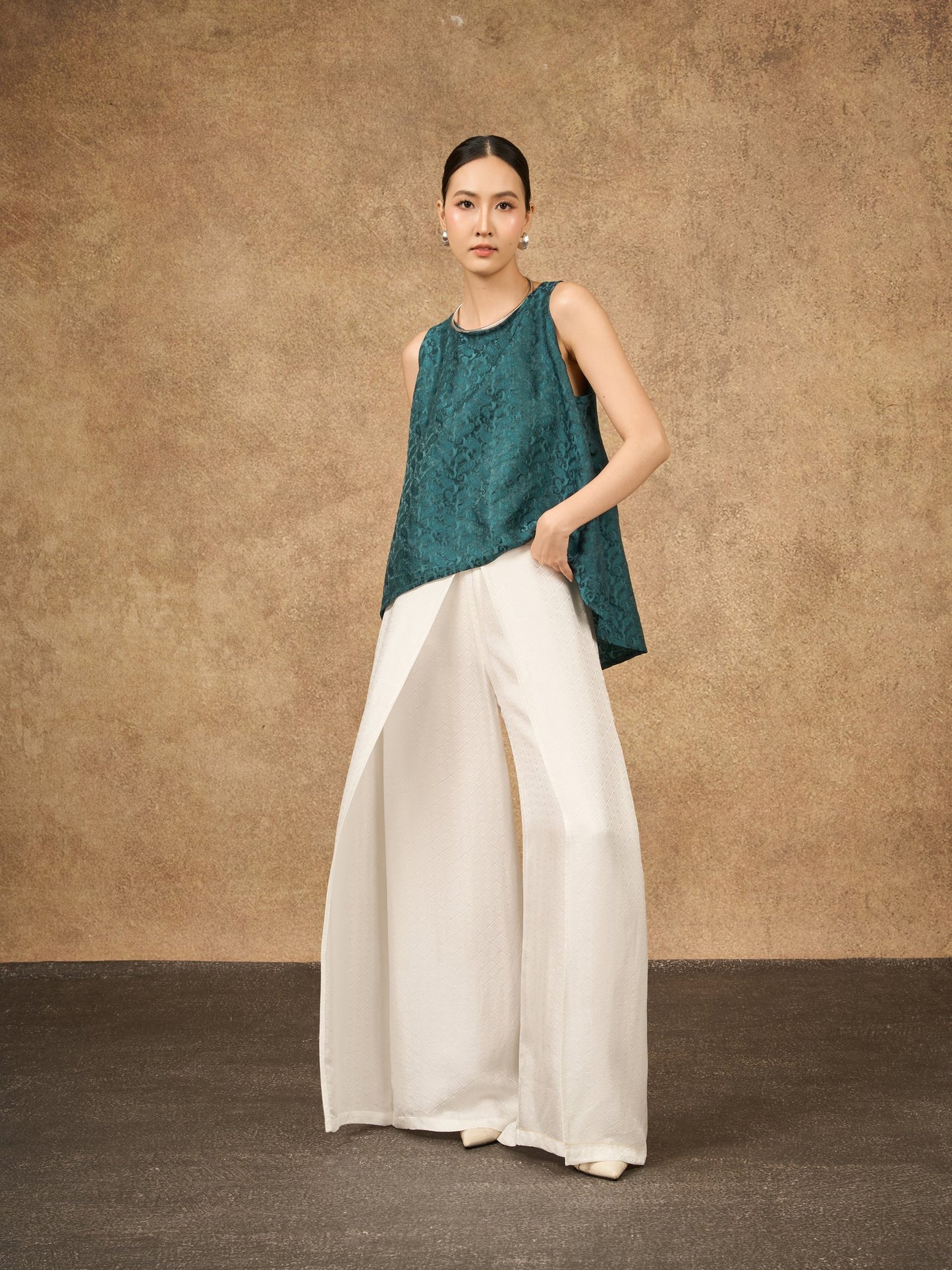 Ophelia teal dynasty draped silk shell top, shown from the side
