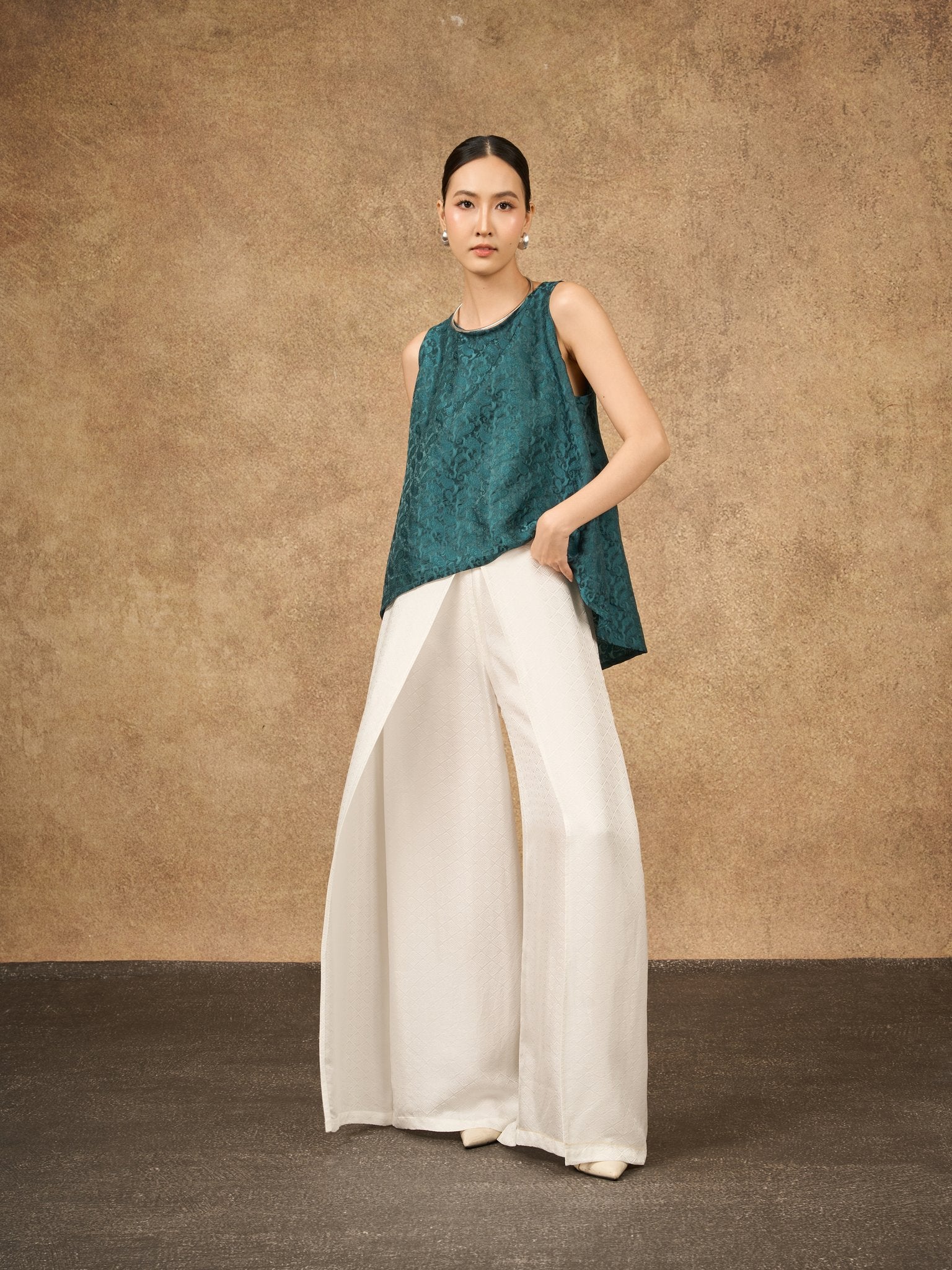 Ophelia teal dynasty draped silk shell top, shown from the side