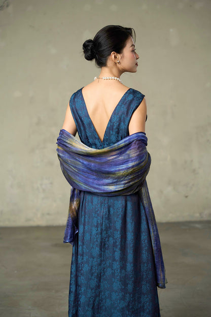 Iris Field banded silk scarf worn as a shoulder wrap