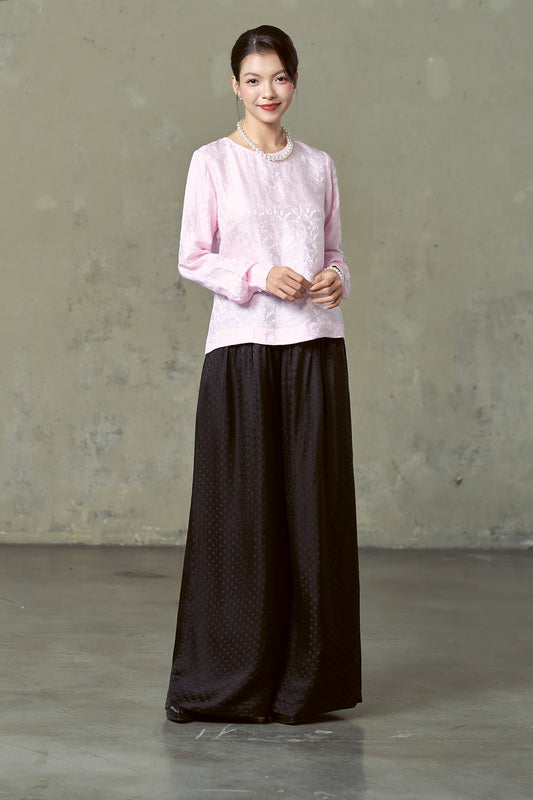 Model in black diamond-dot silk jacquard wide-leg trousers, full length front, Portia Jet Diamond