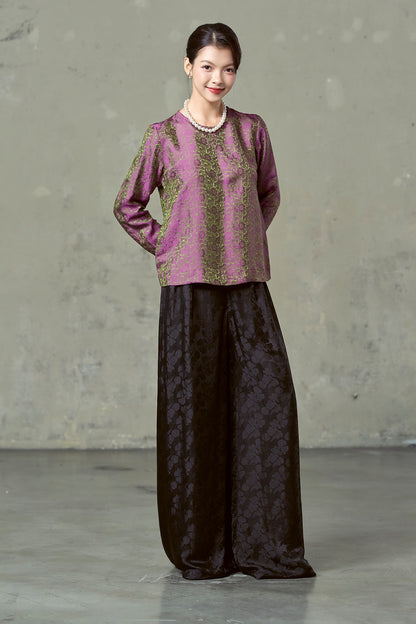 Model in black floral silk jacquard wide-leg trousers, full length front, Rosalind Onyx Peony