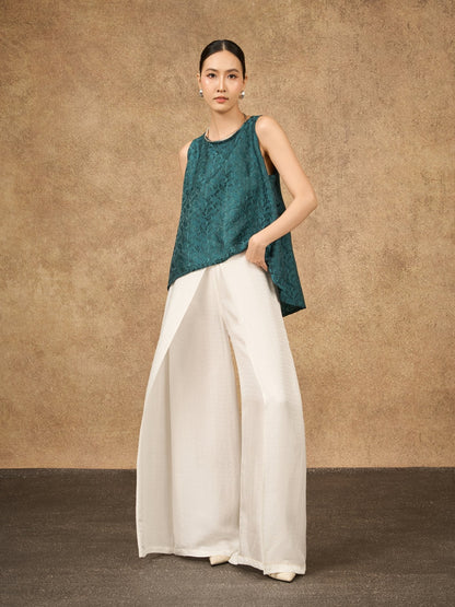 Model wearing the Ophelia ivory mist wide-leg silk palazzo trousers
