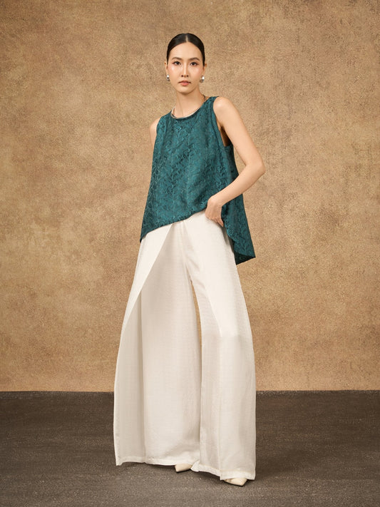 Model wearing the Ophelia ivory mist wide-leg silk palazzo trousers
