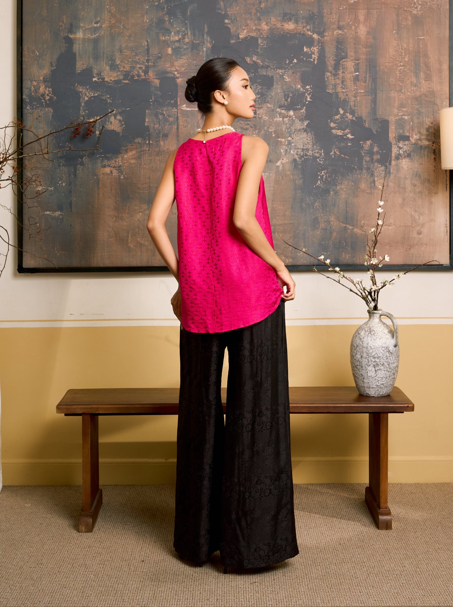 Ophelia black wide-leg silk palazzo trousers styled with a silk shell top