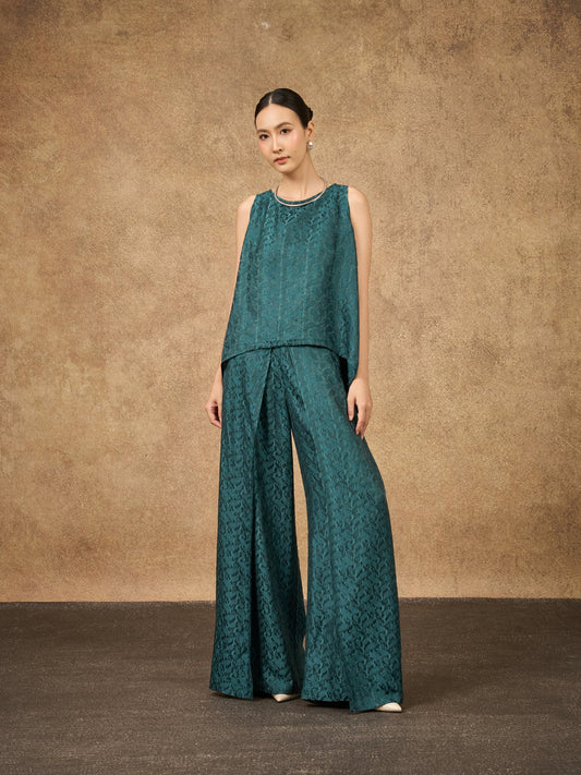 Model wearing the Ophelia teal dynasty wide-leg silk palazzo trousers