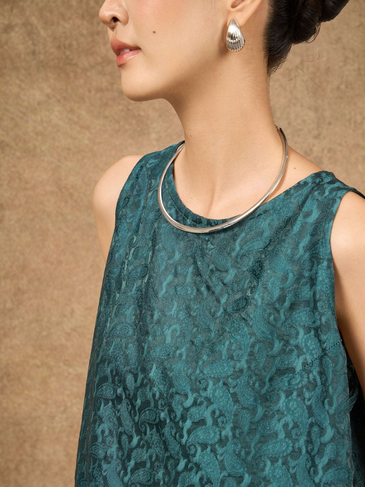 Detail of the Ophelia teal dynasty draped silk shell top