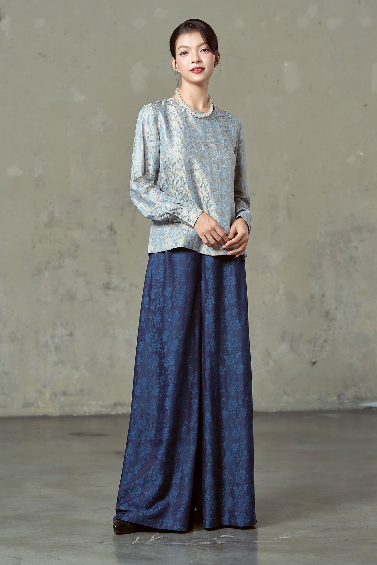 Delft Gold paisley silk blouse worn with Rosalind navy floral silk wide-leg trousers