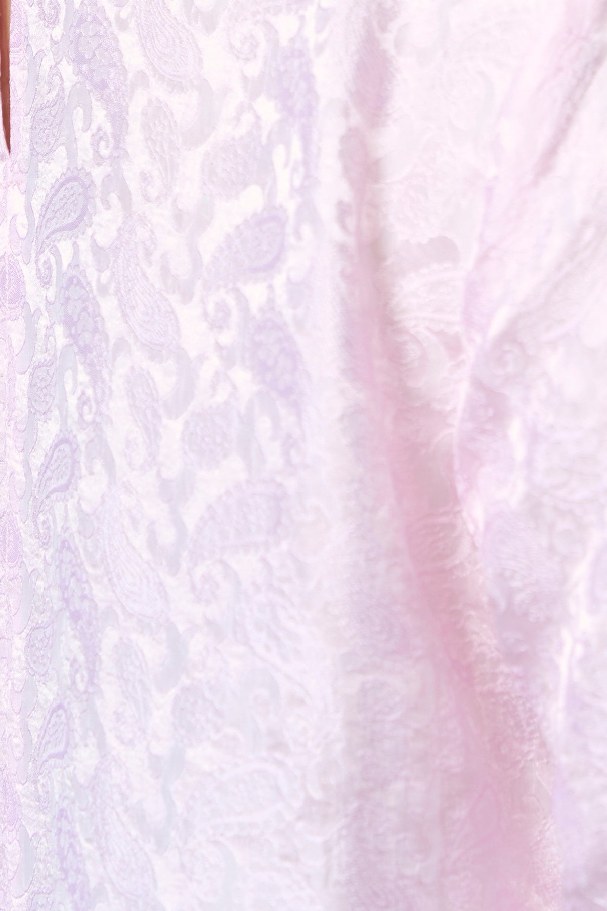Fabric detail of blush pink silk jacquard with a tone-on-tone woven paisley pattern
