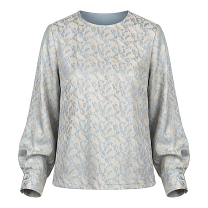 Blue and cream paisley silk jacquard blouse on white background, front view