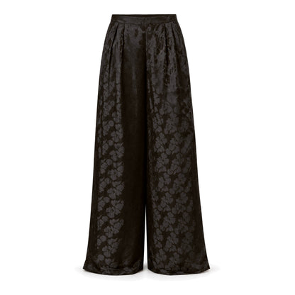 Black floral silk jacquard wide-leg trousers on white background, front view