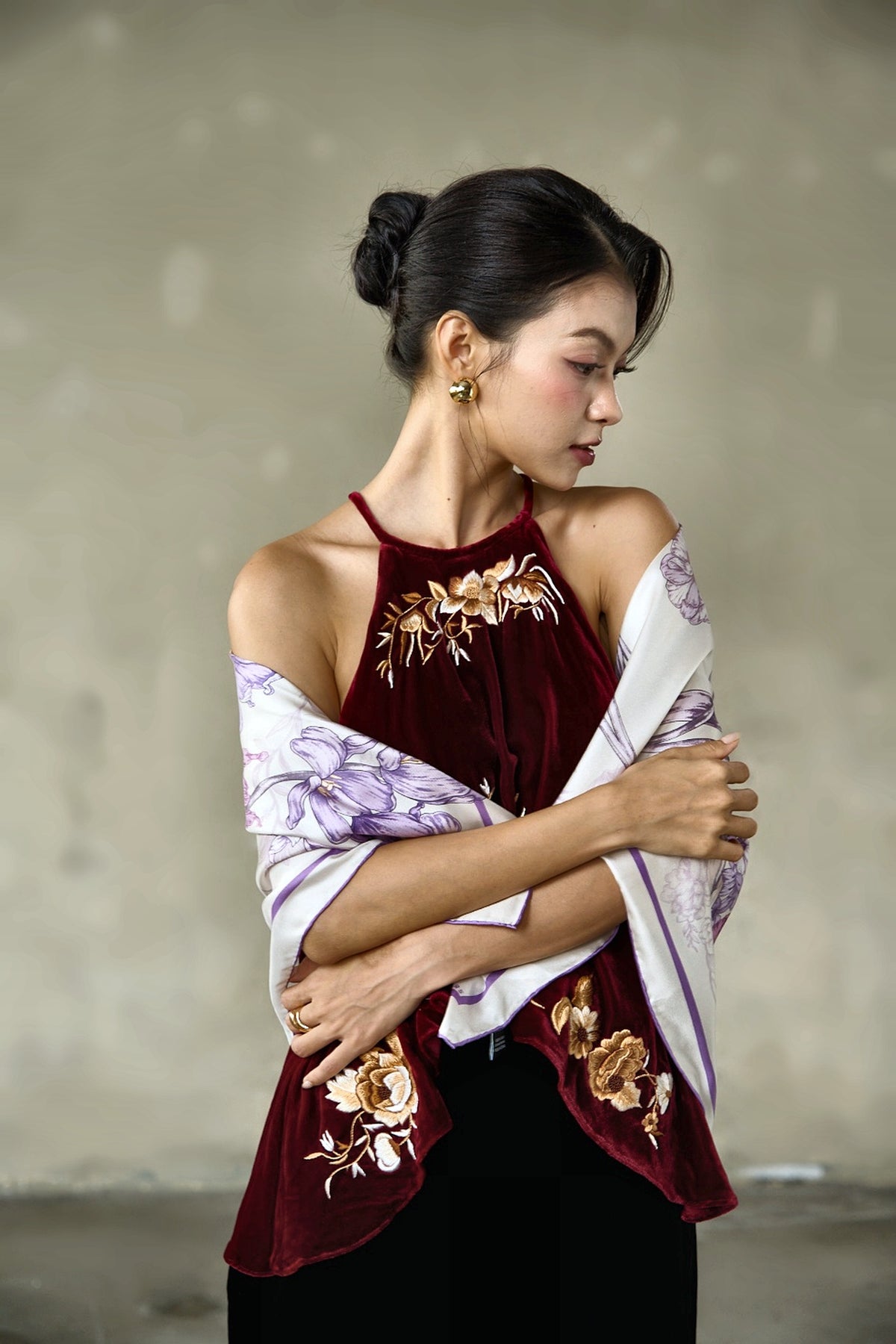 Model with the lilac and violet leopard twill silk scarf wrapped across the shoulders, editorial portrait