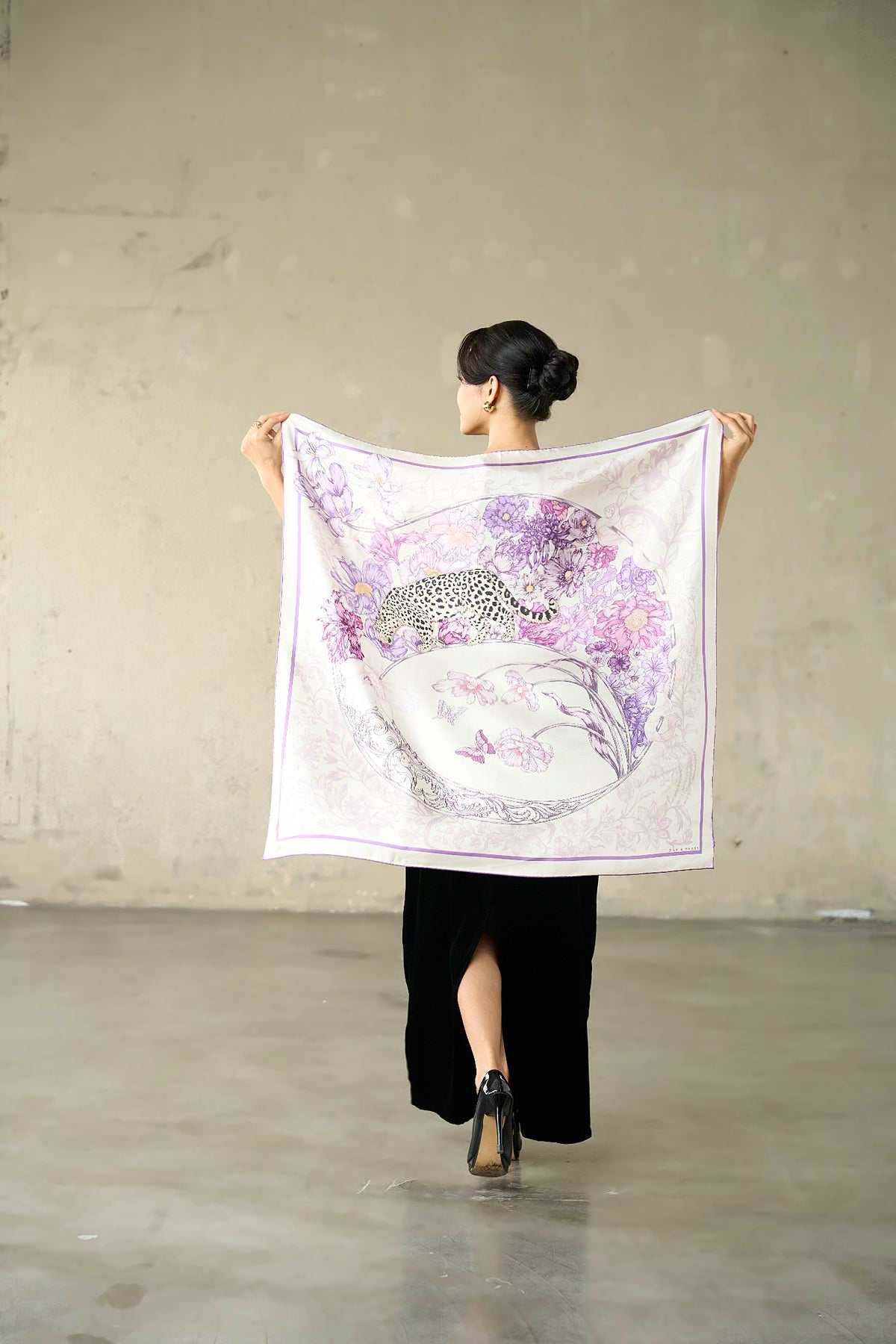 Lilac and violet leopard silk twill scarf held open to show the full 90x90cm printed design