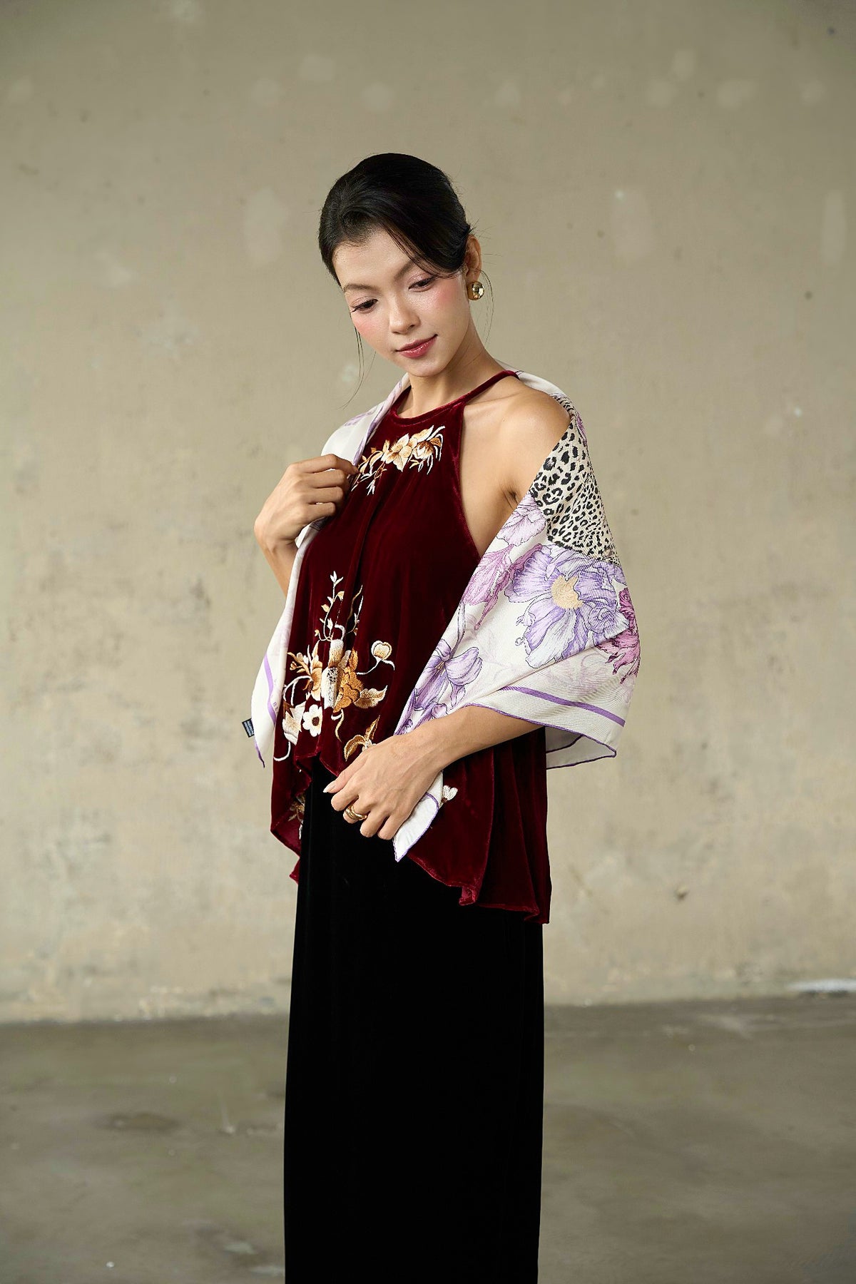 Lilac leopard and floral silk twill scarf worn as an evening shawl over burgundy velvet