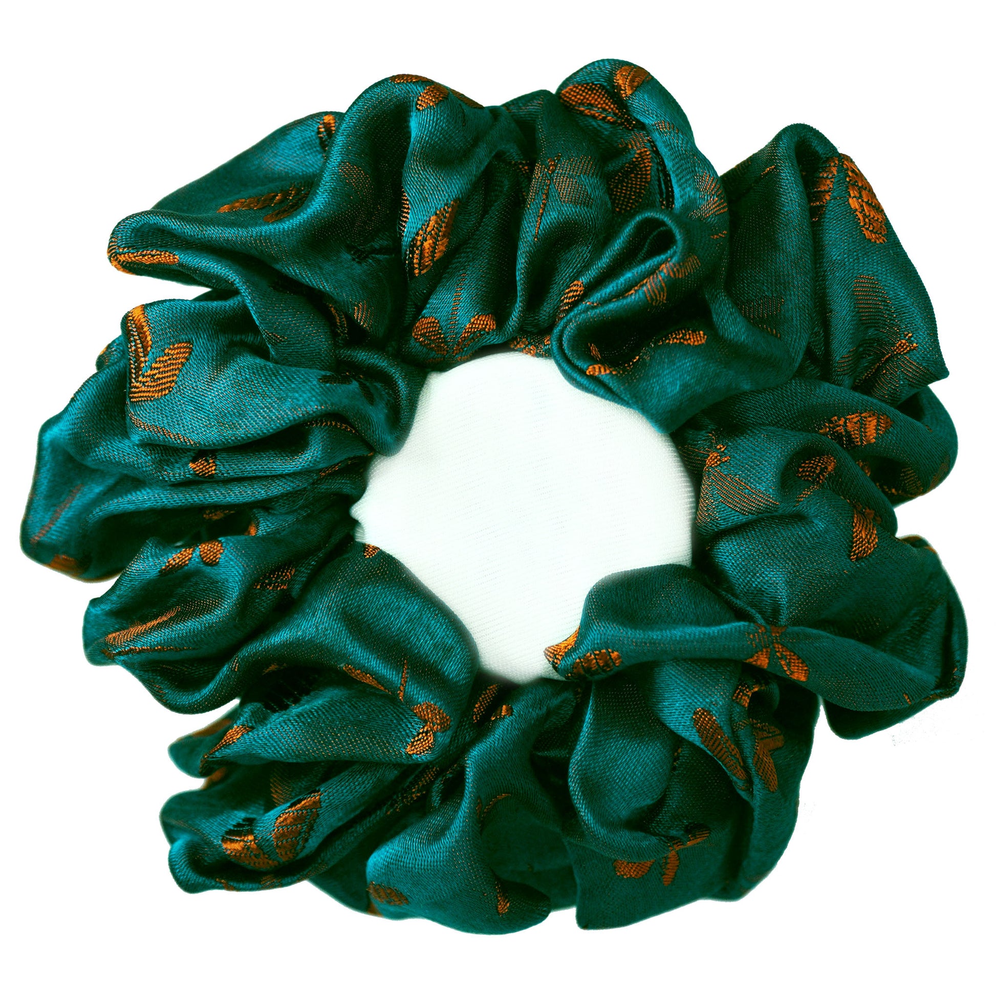 Close-up of the woven dragonfly motif on the silk jacquard scrunchie
