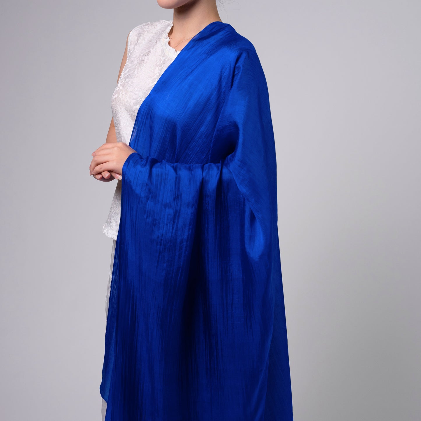 Royal blue silk scarf worn as a flowing shawl, hand-dyed mulberry silk