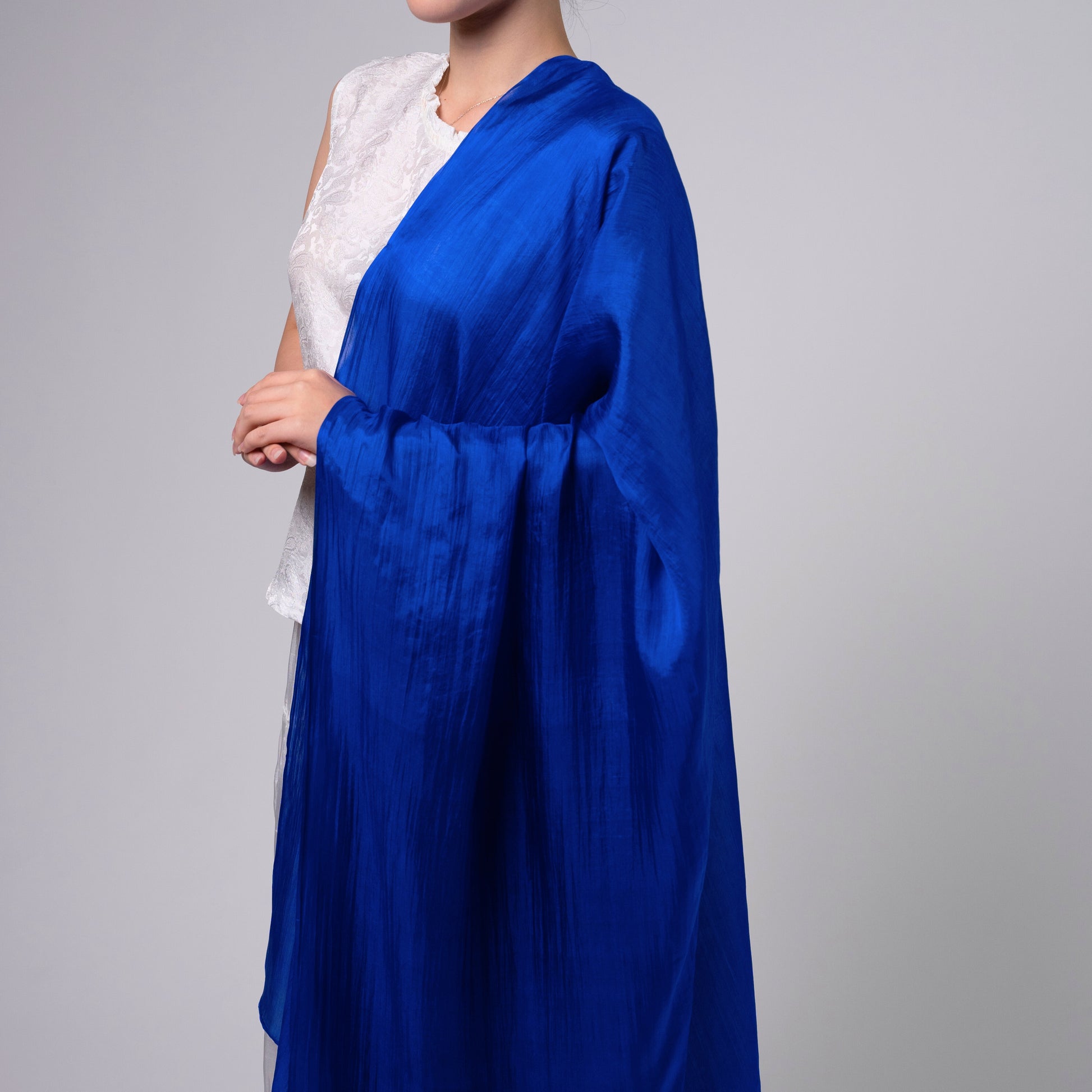 Royal blue silk scarf worn as a flowing shawl, hand-dyed mulberry silk