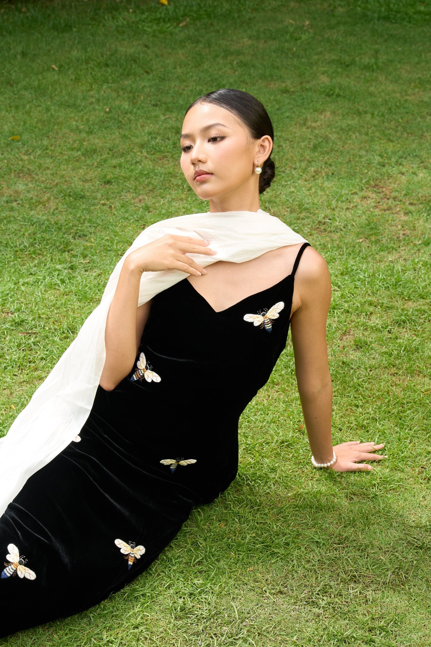 Pearl white silk bridal shawl trailing behind a model — 85×300cm luxury silk cape for weddings