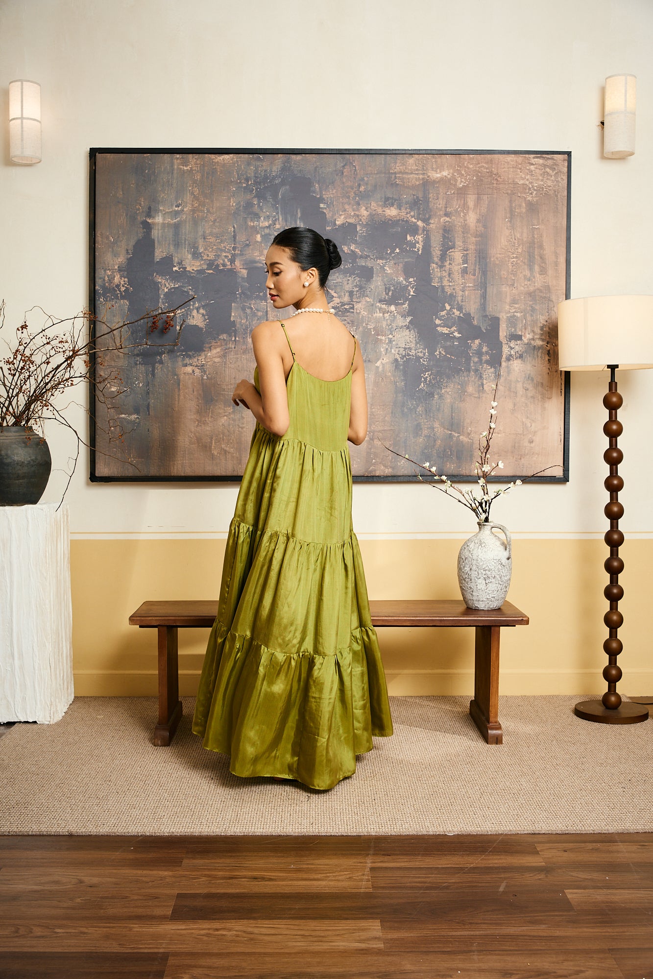 Valentina olive gold habotai silk tiered maxi dress shown from the side