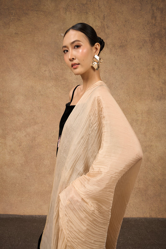 Model wearing champagne gold hand-dyed silk scarf draped over shoulders — Silk & Bears