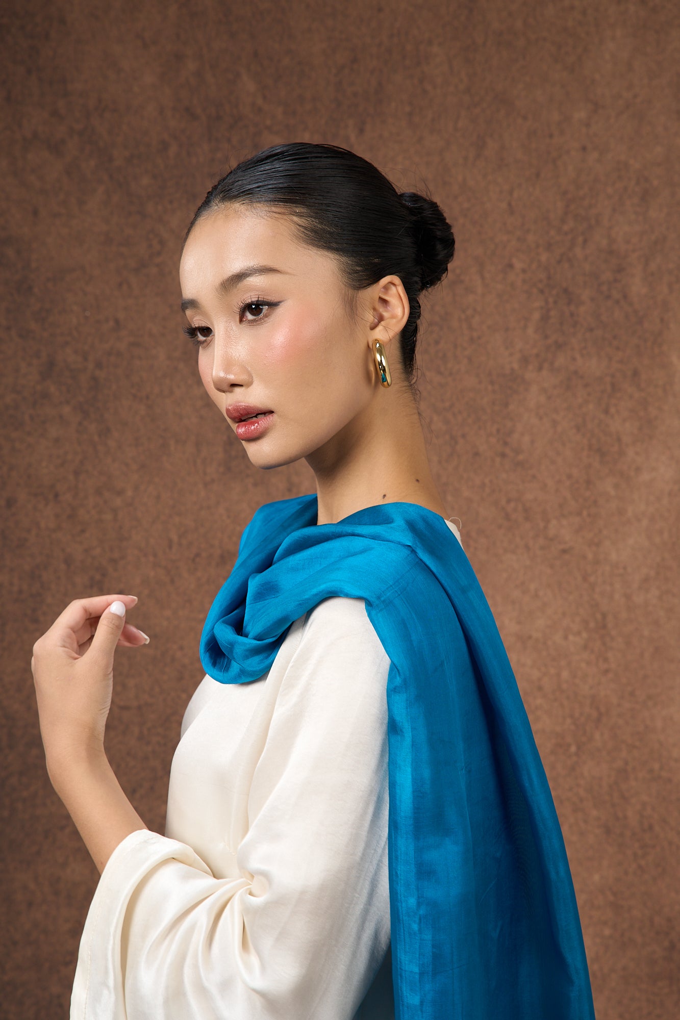 Teal blue silk scarf worn as a flowing shawl, hand-dyed mulberry silk
