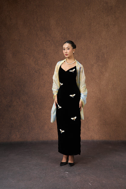 Model wearing a butter yellow and blue brushstroke hand-dyed silk scarf