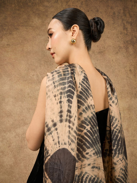 Model wearing copper and black shibori hand-dyed silk scarf draped over shoulders — Silk & Bears