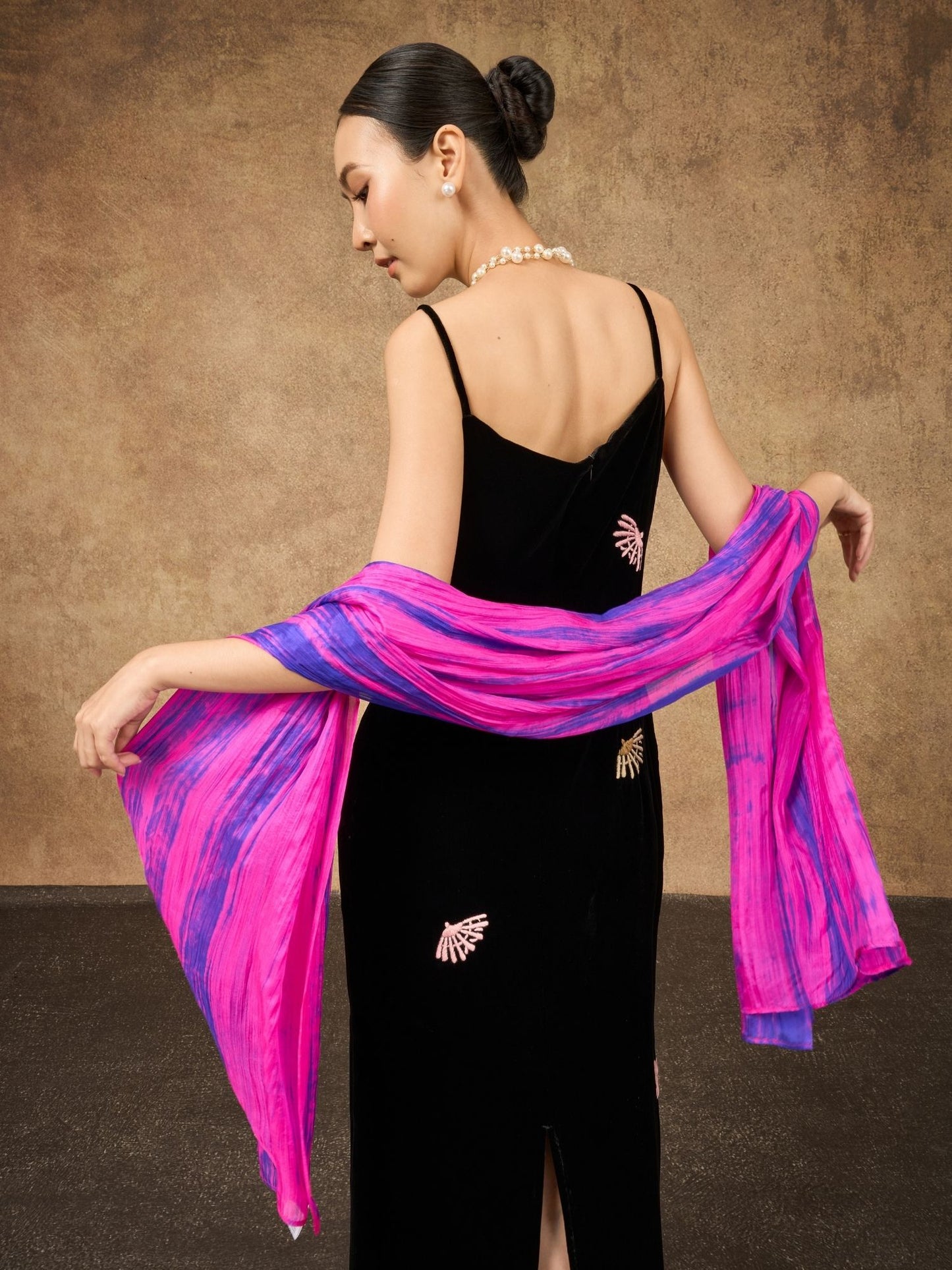 Fuchsia and blue brushstroke silk scarf styled for a special occasion