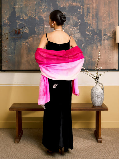 Close-up of the hot pink ombre silk scarf, showing the graduated colour