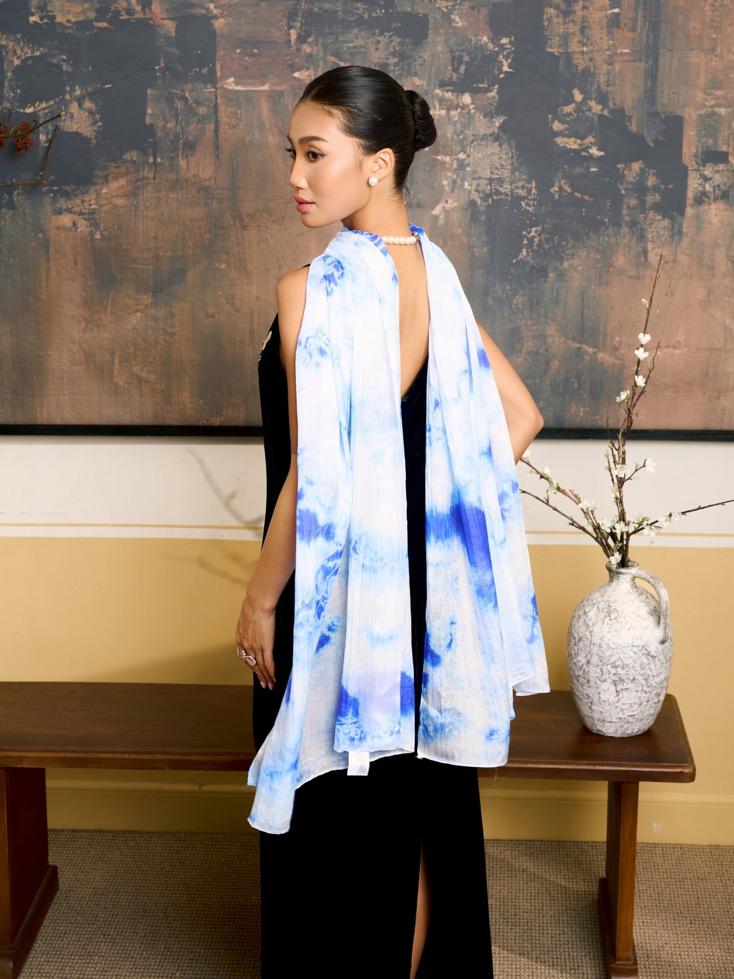 Close-up of the sky blue shibori silk scarf, showing the resist-dyed pattern