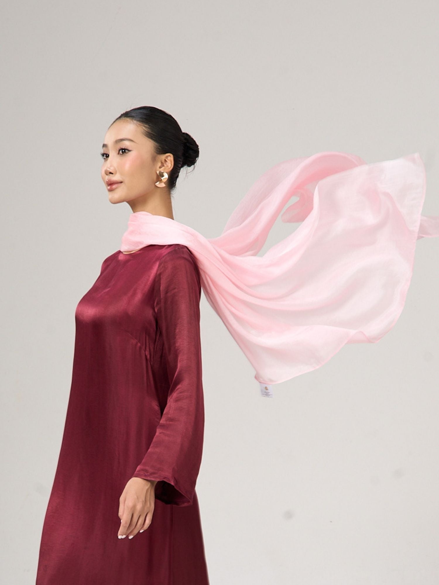 Blush pink silk shawl in natural light, hand-dyed by Silk & Bears artisans
