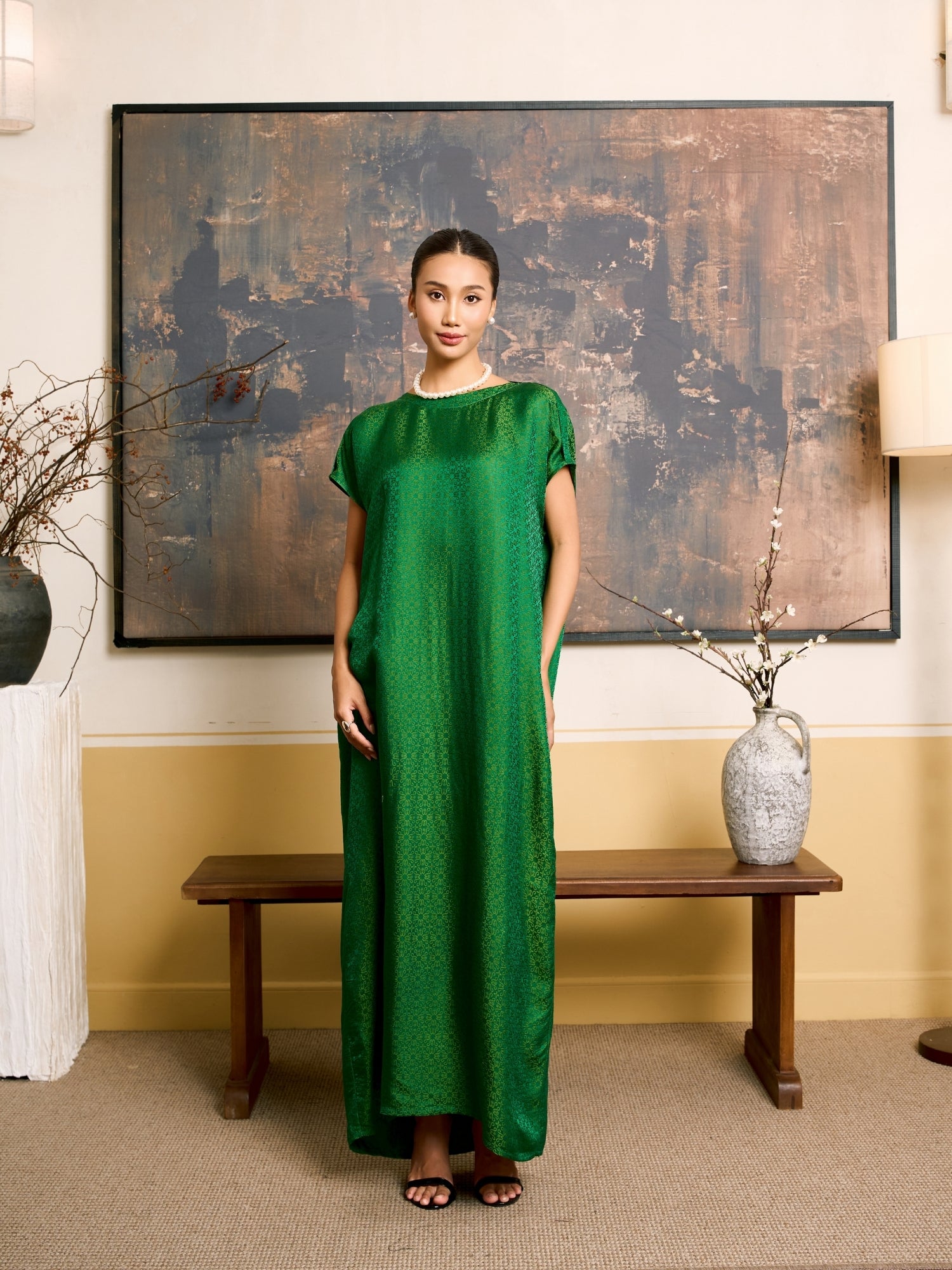 Model wearing the Seraphine emerald jade silk jacquard maxi dress