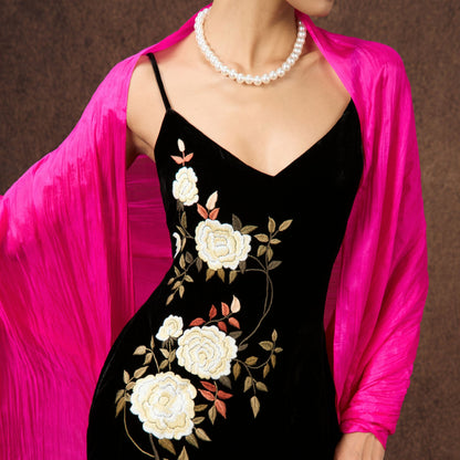 Close-up of the hot pink hand-dyed silk scarf, showing texture and lustre