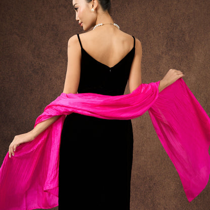 Model wearing a hot pink hand-dyed silk scarf draped over the shoulders