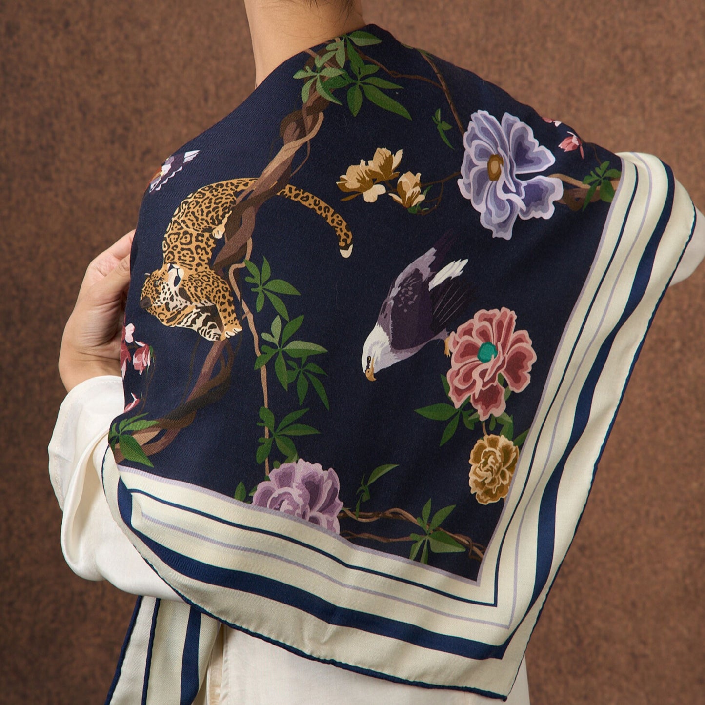 Midnight Safari wool-silk scarf worn as an elegant shawl