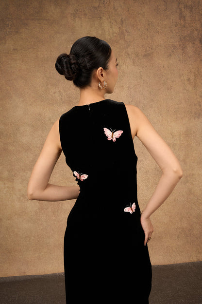 Detail of the bodice of the black butterfly hand-embroidered silk velvet dress