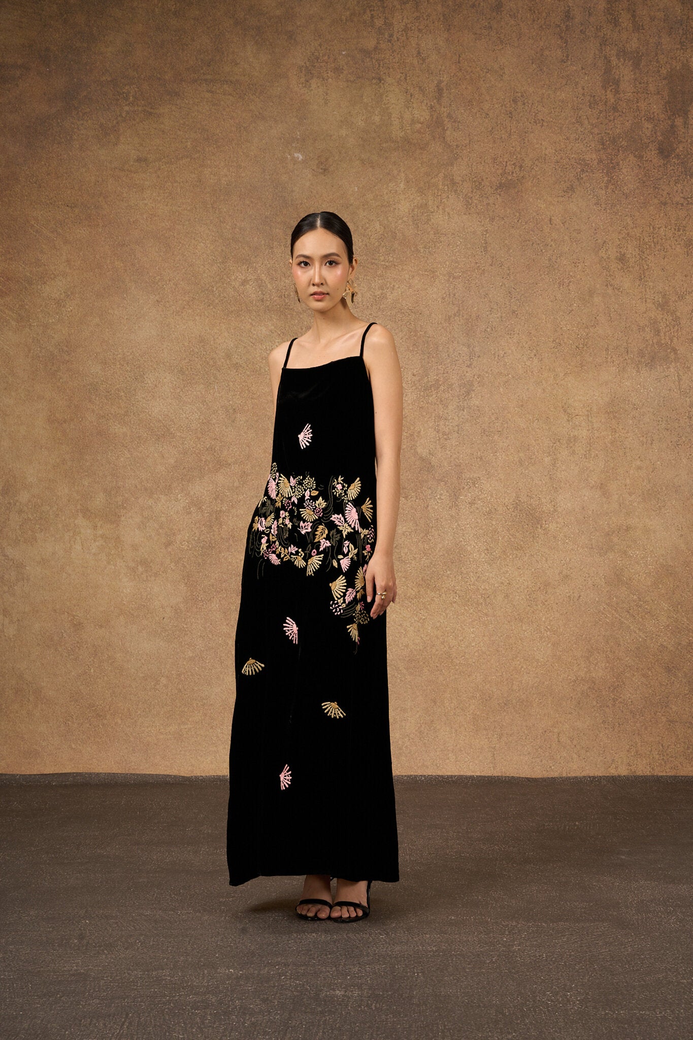 Hand-embroidered black fan-motif silk velvet evening dress, three-quarter view